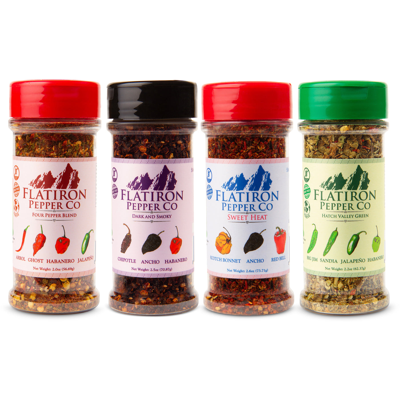 4 bottle pepper flake line up - Four pepper blend dark & Smoky sweet heat and hatch valley green