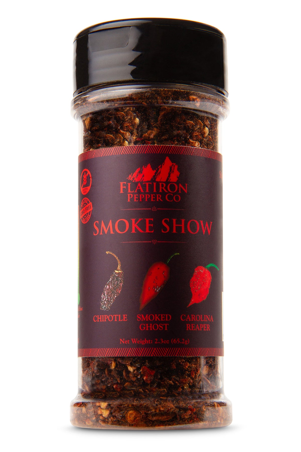 A bottle of Smoke Show chili pepper flakes with the Flatiron Pepper Co. branding on the label.